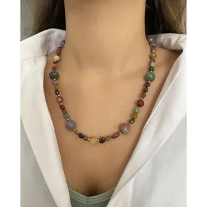 Handmade beaded necklace with multi-colored natural stones and gold spacer accents
