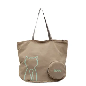 Khaki large canvas tote bag with cat silhouette print and matching round coin purse