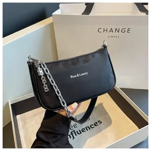 Chic black nylon shoulder bag with luxury silver chain strap in an elegant gift box set