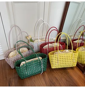 Detailed grid weave of colorful tote bags with drawstring liners in various vibrant colors