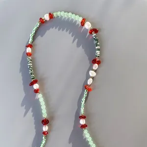 Handmade necklace with natural stones and freshwater pearls in vibrant dopamine colors