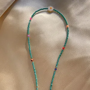 Colorful natural stone and freshwater pearl beaded necklace with white daisy charm