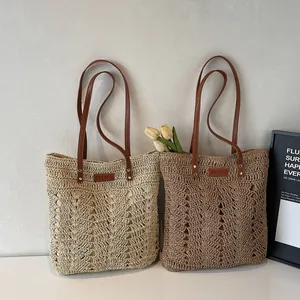 Handwoven straw tote bags with wave pattern and leather straps for beach vacations