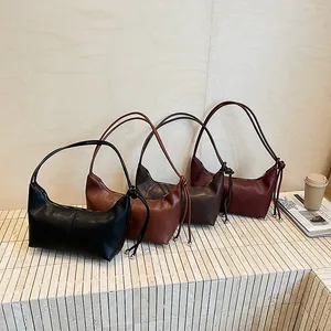 Minimalist solid color hobo shoulder bags in four colors with decorative knotted straps
