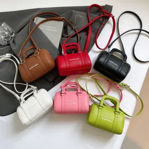 Mini color-block Boston handbags with crossbody straps in six assorted colors and textures