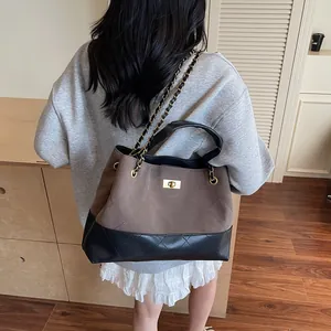 Retro large tote bag with contrast brown and black quilting and chain strap