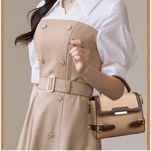 Retro large capacity top handle bag with beige and brown leather patchwork detail