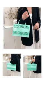 Detail of mint green cutout beach tote with diamond mesh texture and top handle