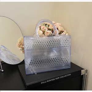 Detail of transparent blue PVC beach tote with lattice texture on a display stand