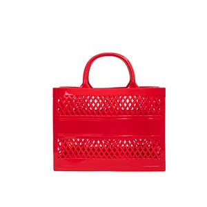 Bright red hollow mesh jelly tote bag with large capacity for beach and summer shopping