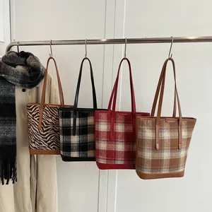 Fashionable zebra and plaid wool bucket bags with large capacity and long straps