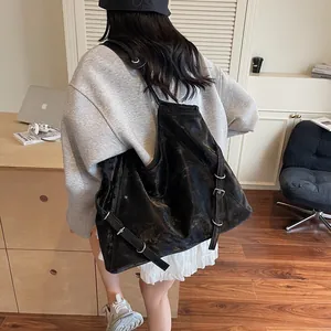 Minimalist black distressed tote bag with large capacity for daily commuting and leisure