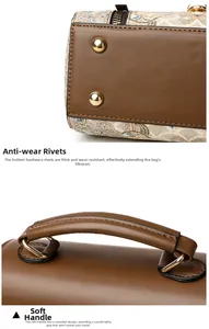 Détail des rivets dorés anti-usure sur la base en cuir et poignée souple du sac à main