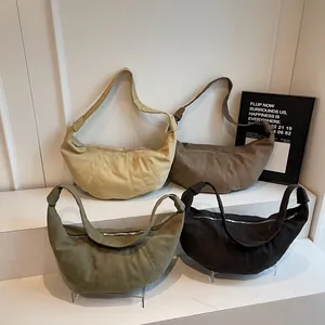 Minimalist large crescent crossbody bags with quilted details in four trendy solid colors