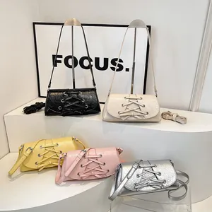 Chic bow-knot crossbody bags in five colors with wrinkled faux leather and metal eyelets