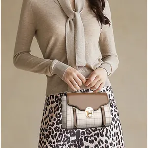 Vintage patchwork plaid crossbody bag with brown leather flap and golden lock