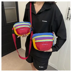 Detailed comparison of two colorful waterproof nylon waist bags with adjustable straps