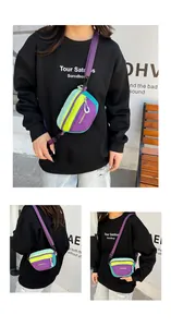 Detailed close-up of a colorful waterproof nylon fanny pack with adjustable strap