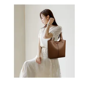 Elegant brown pebbled leather tote bag with large capacity for commuting and daily wear