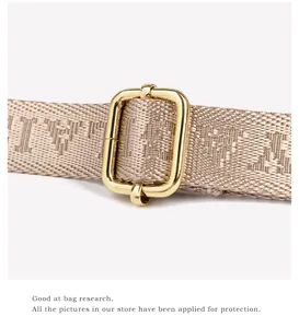 Detailed macro view of adjustable golden metal buckle on jacquard fabric shoulder strap
