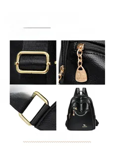 Detail of sturdy gold-tone hardware and adjustable nylon shoulder straps on a black backpack