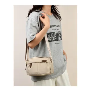 Beige Oxford cloth crossbody bag for women with wide jacquard strap and large capacity