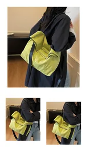 Detail view of the lemon green tote bag showing unique rope strap and fold-over flap closure