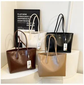 Detailed comparison of minimalist large tote bags in beige, black, coffee, and camel colors