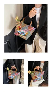 Macro detail of colorful handwoven tote bag featuring bamboo handle and cute dog patch