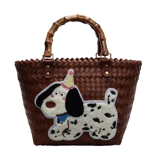 Retro hand-woven brown tote bag with cartoon dalmatian embroidery and bamboo handle