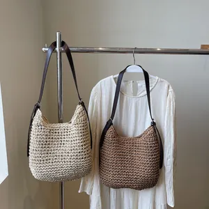 Large straw shoulder bag in beige and brown styles for beach holiday and summer leisure