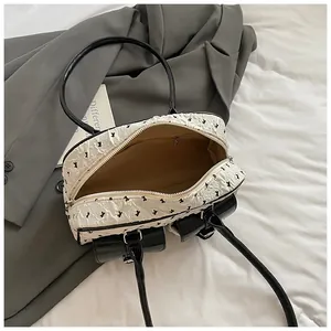 Large summer bowling bag with black bow pattern and premium leather handles