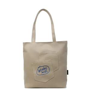 Minimalist beige canvas tote bag with today midi embroidery and dual front pockets