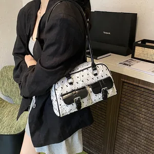 French retro white quilted shoulder bag with black bow print and leather strap