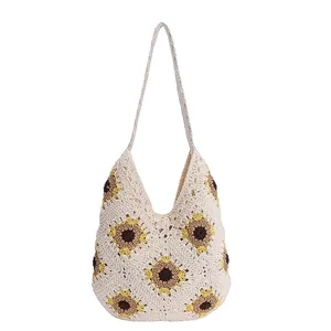 Ethnic knit tote bag with sunflower pattern and long straps for beach summer style