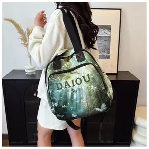 Detail view of large forest print backpack with white butterfly pattern and DAIOU text