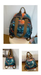 Detail of artistic starry night print on durable nylon backpack with DAIOU logo and sturdy straps