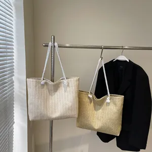 Straw woven tote bag with cotton rope handles for women summer beach vacation style