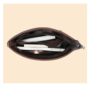 Internal view of the brown bucket bag showing multi-pocket storage and large capacity