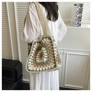 Close-up of handmade crochet tote bag featuring vintage sunflower拼接 and woven strap