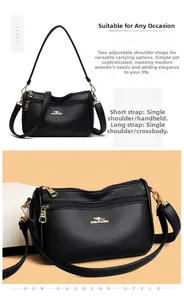 Detail showing high-quality black litchi pattern leather with golden hardware and logo