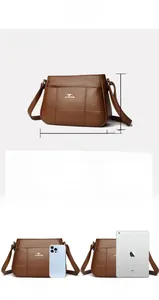 Detail of dark brown leather handbag featuring decorative quilting and golden logo