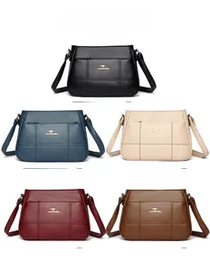 Color display of five lychee textured PU leather crossbody bags with gold logo