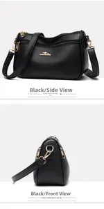 Detailed view of black litchi pattern leather handbag with gold kangaroo metal logo
