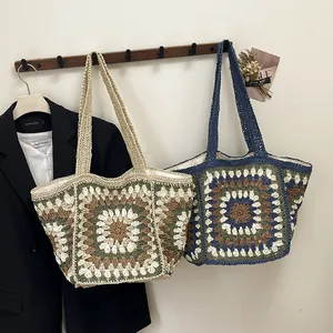 Ethnic style crochet granny square tote bag with vintage flower patterns and shoulder strap