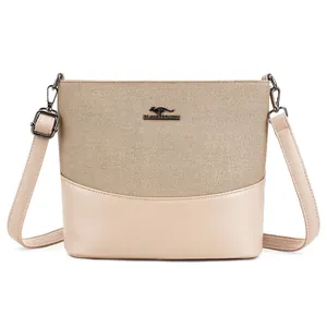 Minimalist large capacity khaki bucket bag with woven texture and adjustable strap