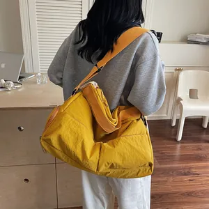 Yellow large capacity nylon shoulder bag for daily commute and casual travel for women