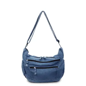 Casual denim tote bag with multiple zipper pockets and adjustable shoulder strap for daily use
