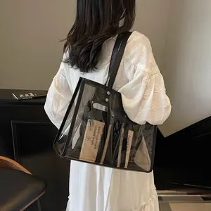 Sac cabas minimaliste en PVC transparent avec bandoulières en cuir noir pour femme