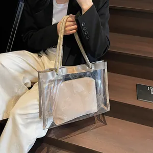 Transparent PVC tote bag with canvas inner pouch and woven rope handles for summer